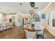 Open-concept living space with a dining area, kitchen, and modern finishes at 1831 Mizell Ave, Winter Park, FL 32789