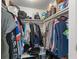 Walk-in closet featuring an organization system with shelves and hanging racks at 1956 Lake Atriums Cir # 146, Orlando, FL 32839