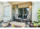 Cozy covered patio with comfortable seating, perfect for outdoor relaxation and entertaining at 1956 Lake Atriums Cir # 146, Orlando, FL 32839