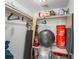 Well-organized storage room includes shelving and floor space for totes and athletic equipment at 1956 Lake Atriums Cir # 146, Orlando, FL 32839