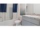 Neutral bathroom with tub/shower combination, granite counter, and vanity at 2155 Kalin Way, Tavares, FL 32778