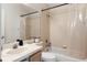 Standard bathroom with shower-tub combo, large mirror, and neutral tiling at 2239 Meadowmouse St, Orlando, FL 32837