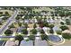 A nice house is nestled among trees in a tranquil neighborhood near a golf course at 2503 Squaw Crk, Clermont, FL 34711
