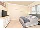 Relaxing bedroom featuring a large bed, dresser, and comfortable decor in a bright and inviting space at 2503 Squaw Crk, Clermont, FL 34711