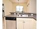 Spacious kitchen featuring stainless steel appliances, granite countertops, and ample cabinet space at 2503 Squaw Crk, Clermont, FL 34711