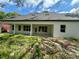 Home's backyard with a covered patio at 335 Ruth Blvd, Longwood, FL 32750