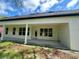 Home's backyard featuring a covered patio at 335 Ruth Blvd, Longwood, FL 32750