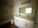 Stylish bathroom with double vanity, modern fixtures, and a shower-tub combination at 335 Ruth Blvd, Longwood, FL 32750