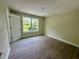 Spacious bedroom featuring hardwood floors and ample natural light at 335 Ruth Blvd, Longwood, FL 32750