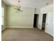Well-lit dining room with a modern chandelier, neutral walls, and wood-look flooring at 335 Ruth Blvd, Longwood, FL 32750