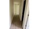 Hallway with hardwood floors leading to bedrooms and other areas of the house at 335 Ruth Blvd, Longwood, FL 32750