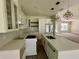 Modern kitchen with granite counters, an island, and stainless steel appliances at 335 Ruth Blvd, Longwood, FL 32750