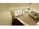 Elevated view of open concept living space with hardwood floors and new finishes at 335 Ruth Blvd, Longwood, FL 32750