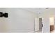 Spacious bedroom with mounted TV and ensuite bathroom offers style and comfort at 3629 Vega Creek Dr, St Cloud, FL 34772