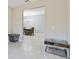 Spacious foyer showcasing neutral walls and tiled flooring, flowing into an adjacent dining area at 3629 Vega Creek Dr, St Cloud, FL 34772