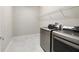 Laundry room with stainless steel washer and dryer at 3629 Vega Creek Dr, St Cloud, FL 34772