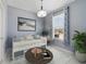 Cozy room with a daybed, picture window, and accent table at 3629 Vega Creek Dr, St Cloud, FL 34772