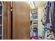 Walk-in closet with shelving and hanging space for organized storage of clothing and accessories at 383 Brushwood Ln, Winter Springs, FL 32708