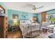 Main bedroom featuring light blue walls, and sliding doors overlooking the outdoor area at 383 Brushwood Ln, Winter Springs, FL 32708