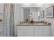 Bright bathroom features double sinks, granite countertops, and a shower-tub combination at 3896 Diving Dove Ln, Bartow, FL 33830