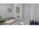 Pristine bathroom featuring a vanity with granite counters and shower and tub combination at 3896 Diving Dove Ln, Bartow, FL 33830