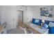 Bright office featuring a rustic desk, accent wall, and a comfy chair for a pleasant workspace at 3896 Diving Dove Ln, Bartow, FL 33830