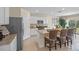 Bright, modern kitchen with stainless steel appliances, granite countertops, and an island at 3908 Diving Dove Ln, Bartow, FL 33830