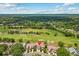 Expansive aerial view of golf course community at 3928 Villas Green Cir, Longwood, FL 32779