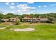 An aerial view of the golf course-adjacent townhomes at 3928 Villas Green Cir, Longwood, FL 32779