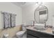 Cozy bathroom featuring granite countertops, and modern fixtures at 3928 Villas Green Cir, Longwood, FL 32779