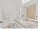 Bright bathroom with single sink, towel rack, and shower at 3928 Villas Green Cir, Longwood, FL 32779