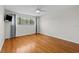 Bedroom with hardwood flooring, ceiling fan and outside views at 3928 Villas Green Cir, Longwood, FL 32779
