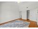 Vaulted ceiling bedroom with hardwood floors, ceiling fan, and closet at 3928 Villas Green Cir, Longwood, FL 32779