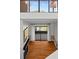 View from upstairs looks down into the living room and patio at 3928 Villas Green Cir, Longwood, FL 32779
