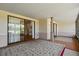 Enclosed patio that provides views to the living room and golf course at 3928 Villas Green Cir, Longwood, FL 32779