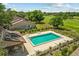 Aerial view of community pool, perfect for relaxation and recreation at 3928 Villas Green Cir, Longwood, FL 32779
