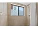 Shower stall with adjustable shower head and tiled walls at 3928 Villas Green Cir, Longwood, FL 32779