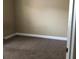 Cozy bedroom featuring neutral walls, brown carpet, and white trim at 410 Horizon Dr, Winter Springs, FL 32708