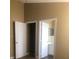 View of bedroom closet and bathroom from bedroom doorway at 410 Horizon Dr, Winter Springs, FL 32708