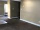 Spacious living room with neutral walls and carpeting, offering a blank canvas for personalization at 410 Horizon Dr, Winter Springs, FL 32708