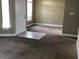 Cozy living room featuring neutral walls, carpeting, and a tiled entrance, bathed in natural light at 410 Horizon Dr, Winter Springs, FL 32708