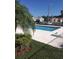 A clean community pool bordered by well-maintained landscaping offers a refreshing escape at 410 Horizon Dr, Winter Springs, FL 32708