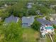 Expansive backyard featuring a screened pool, mature trees, and plenty of green space in this desirable community at 5108 Sailwind Cir, Orlando, FL 32810
