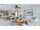 Inviting open-concept living area with stylish furnishings and seamless flow to the dining space at 5113 Forget Me Not Ave, Lake Hamilton, FL 33851