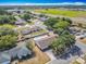 Spacious backyard with privacy fence, in-ground pool, and a prime location near a green space at 601 Francis St, Kissimmee, FL 34741