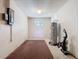 Unfinished basement with water heater and electrical panel provides extra storage space at 601 Francis St, Kissimmee, FL 34741