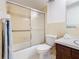 Bathroom featuring shower-tub combination and toilet at 601 Francis St, Kissimmee, FL 34741