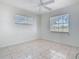 Bedroom featuring tile floors, natural light and ceiling fan at 601 Francis St, Kissimmee, FL 34741