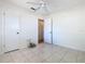 Bright bedroom with ceiling fan and tile flooring at 601 Francis St, Kissimmee, FL 34741