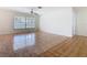 Spacious living area featuring tiled floors, large windows, ceiling fan, and ample natural light at 601 Francis St, Kissimmee, FL 34741